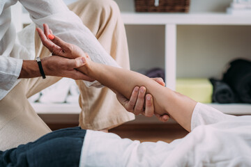 Shiatsu Hand Massage. Therapist Massaging the Heart Meridian.