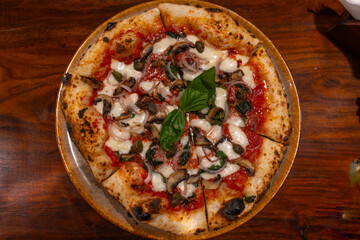 neapolitan homemade pizza margarita from the brick oven. Napoleon Italian Pizza with fresh...