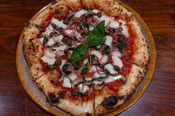neapolitan homemade pizza margarita from the brick oven. Napoleon Italian Pizza with fresh...