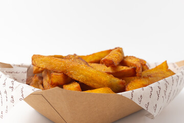 Sweet potato fries on a white background
