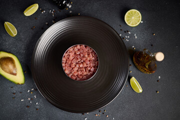 Tuna and avocado tartare recipe - cooking form with sliced chopped tuna fillet