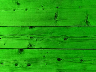 New green wooden plank natural knots pattern background. Salad green modern color wooden wall,...