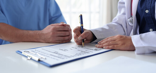 The doctor is examining the patients according to the checklist, annual visits to the doctor for physical examination. And follow the symptom check after taking medicine, health examination concept