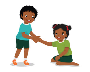 Cute little African boy helping his friend who has fell down to stand up  © Tenstudio
