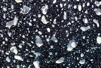 Dirt on the body of a black car. Abstract background