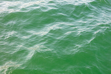 Turquoise water in the sea as an abstract background. Texture