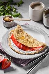 oatmeal pancake with cream cheese and strawberries