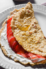 oatmeal pancake with cream cheese and strawberries