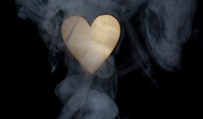 Valentine homemade wooden love hearts burning an burned smoking with unique patterns and textures