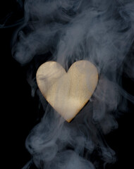 Valentine homemade wooden love hearts burning an burned smoking with unique patterns and textures