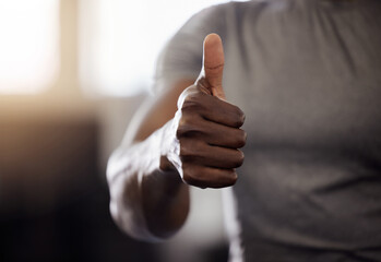 Fitness, hand and man at gym with thumbs up for exercise, support or workout challenge motivation....