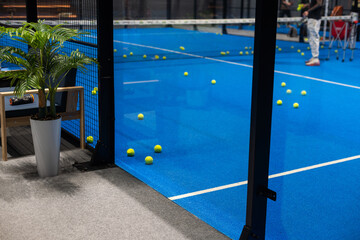 Blue padel and tennis net and hard court. Tennis competition concept. Horizontal sport theme...