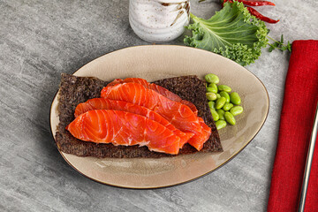 Sliced salmon sashimi in the plate