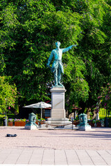 Karl XII, the Swedish kings statue stands commanding in Kungstradgarden, Stockholm, amidst the lush...