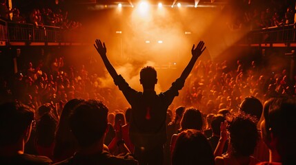 A performer takes a bow to thunderous applause from the audience