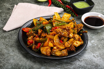 Vietnamese cuisine - fried frog with vegetables