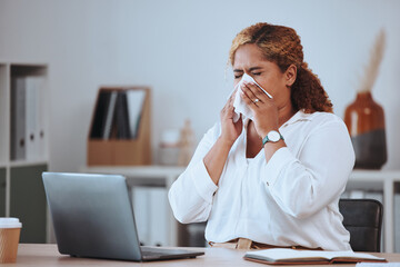 Woman, sick and blowing nose in office with tissue for sneeze, allergies or sinusitis with laptop....