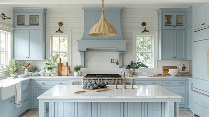 Serene kitchen with soft blue tones, white tiling, and a tranquil vibe