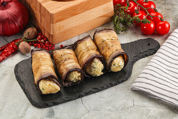 Baked eggplant roll with cheese