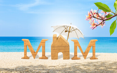 Mother's day card background idea, tropical style, miniature house and wooden letter on tropical sandy beach with beach umbrella and Plumeria flower, outdoor day light