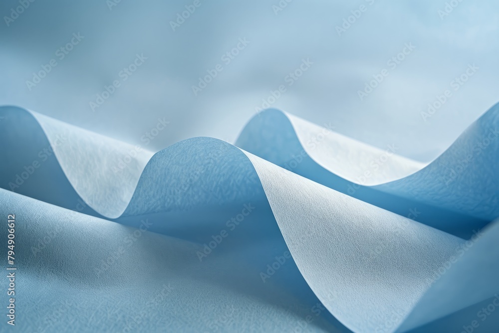 Aufkleber a close-up view of a smooth surface featuring light blue and white decorative paper, creating a mini