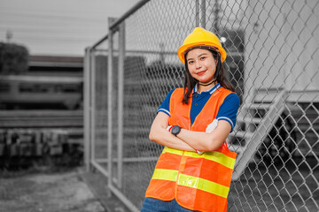 portrait young women worker standing happy smile with safety hardhat. smart employee lady working in industry. - 794912854