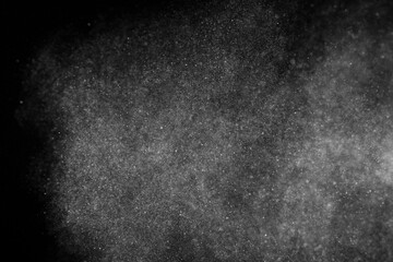White texture on black background. Dark textured pattern. Abstract dust overlay. Light powder explosion.	
 - obrazy, fototapety, plakaty