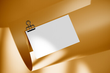 Business card with clip on rolled paper mockup. 3D rendering