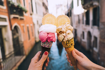 Delicious gelato or ice cream in waffle cone in Venice Italy.