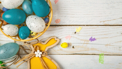 Art Happy Easter concept. Frame of Easter eggs, greeting card and on wooden background. Flat lay, top view, copy space. - obrazy, fototapety, plakaty