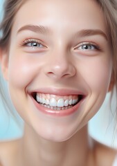 
In a radiant close-up, a woman's smiling face beams with joy and confidence, her eyes sparkling with happiness and her lips curved in a captivating smile.