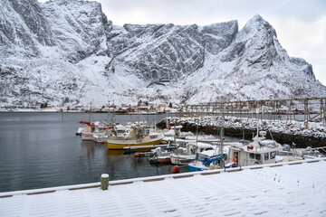 Reine, Norway - 21 Nov, 2023: winter landscape, Reine is a breathtaking fishing village on the northern Lofoten archipelago