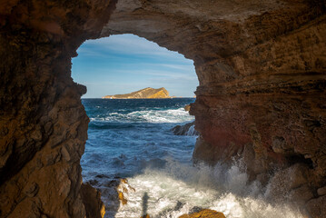 View of S Espartar islet from Sa Figuera cave, Cap des Bou cape, San Josep de Sa Talaia, Ibiza, Balearic Islands, Spain