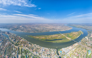 Astrakhan, Russia. Panorama of the city from the air in summer. The Volga River and Gorodstoy...