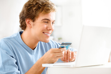 Man, order and laptop for credit card in home to buy, finance and website for online shopping. Male...