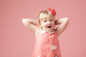 Studio, child or girl with shock by mockup for surprise, expression and isolated on pink...