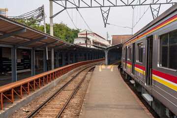 Fototapeta na wymiar Old Japanese commuter train at Jakarta Kota station