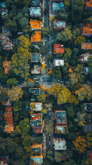 Aerial view of colorful rooftops and lush greenery in urban area