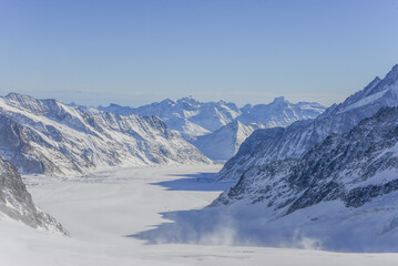 Obraz premium Landscape Views From Jungfrau Mountain Range And View Of The Large Aletsch Glacier Under Clear Sky, Switzerland