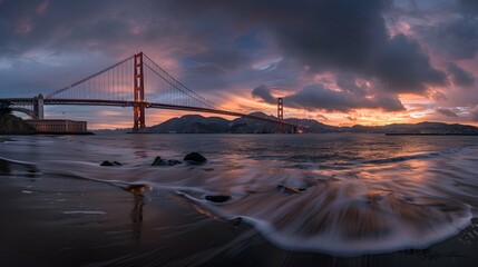 Golden Gate Bridge panorama, San Francisco California, sunset light on cloudy sky