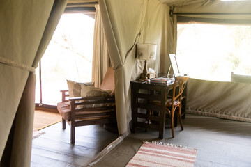 desk and chair in a safari tent on safari in the Masai Mara in Kenya