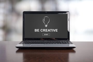 Be creative concept on a laptop - 795036033