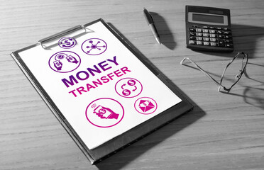 Money transfer concept on a desk