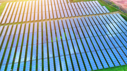 A solar power plant employs photovoltaic cells to convert sunlight into electrical energy. It...