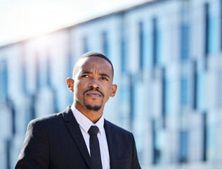 Thinking, serious and man in city for business work, determined and ready for corporate career in...