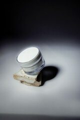 cosmetic cream container with shadows