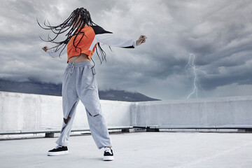 Girl, dance and hip hop outdoor on city rooftop with lightning storm and cool gen z streetwear...