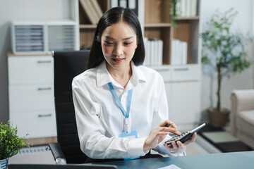 businesswoman working at office with laptop and documents on his desk, financial adviser analyzing data.