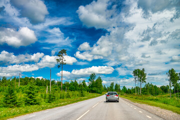 A road across the Estonia countryside, summer season