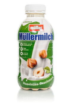 Müllermilch hazelnut flavor in a bottle by Theo Müller company isolated on a white background